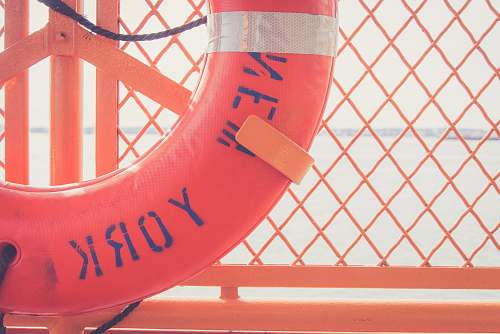 united states red inflatable floater ring on orange metal rack ring